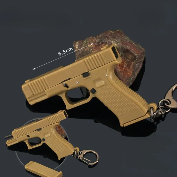 ⁦6.5cm Glock G18 Plastic Pistol Weapon Model Keychain Game Pendant Ornaments Model Christmas Gifts Children's Toys Gifts for Boys⁩ - الصورة ⁦4⁩