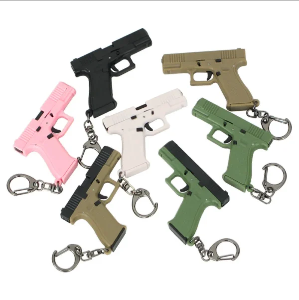 ⁦6.5cm Glock G18 Plastic Pistol Weapon Model Keychain Game Pendant Ornaments Model Christmas Gifts Children's Toys Gifts for Boys⁩ - الصورة ⁦6⁩