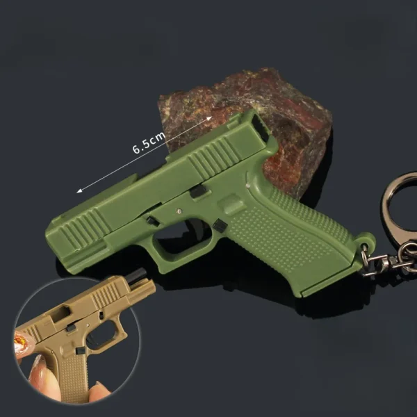 ⁦6.5cm Glock G18 Plastic Pistol Weapon Model Keychain Game Pendant Ornaments Model Christmas Gifts Children's Toys Gifts for Boys⁩ - الصورة ⁦2⁩